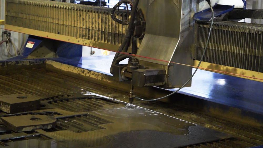 A waterjet cutter in action